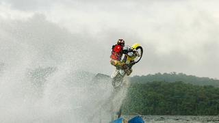 Travis Pastrana Jumps Motorycle From Water